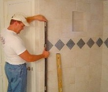 measuring the bathroom wall
